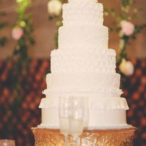 All white 6-tiered wedding cake.   Wedding by Southern Event Planners. Photo by Natasha Durham Photography