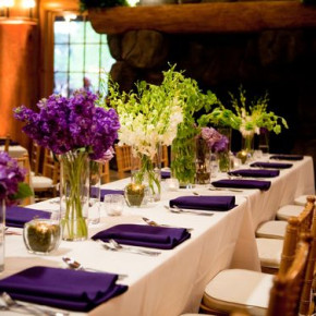 Purple, white, and green floral tablescape centerpieces  Floral and Decor by Southern Event Planners