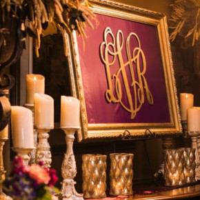 Easily decorate your entry way with a framed monogram and a few candles! Plus, you can reuse and hang your monogram in your house after your wedding!   Floral and décor by Southern Event Planners Photo by Snap Happy