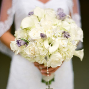 White bride's bouquet with a touch of purple.   Wedding and floral by Southern Event Planners.  #memphiswedding #memphisflorist #bridebouquet #whitebouquet
