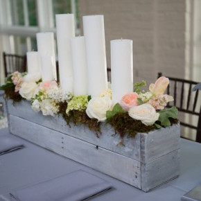 Candle and floral, rustic centerpiece by Southern Event Planners, Memphis, Tennessee.