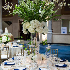 Elegant, tall, white hydrangea centerpiece  Floral and Decor by Southern Event Planners