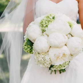 White bridal bouquet with a hint of green.   Photo by Christen Morrison Floral by Southern Event Planners