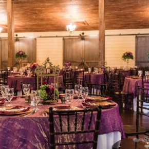 Wedding reception with shades of purple.  Floral and décor by Southern Event Planners Photo by Snap Happy